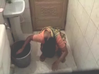 Mature aunty cought in her toilet